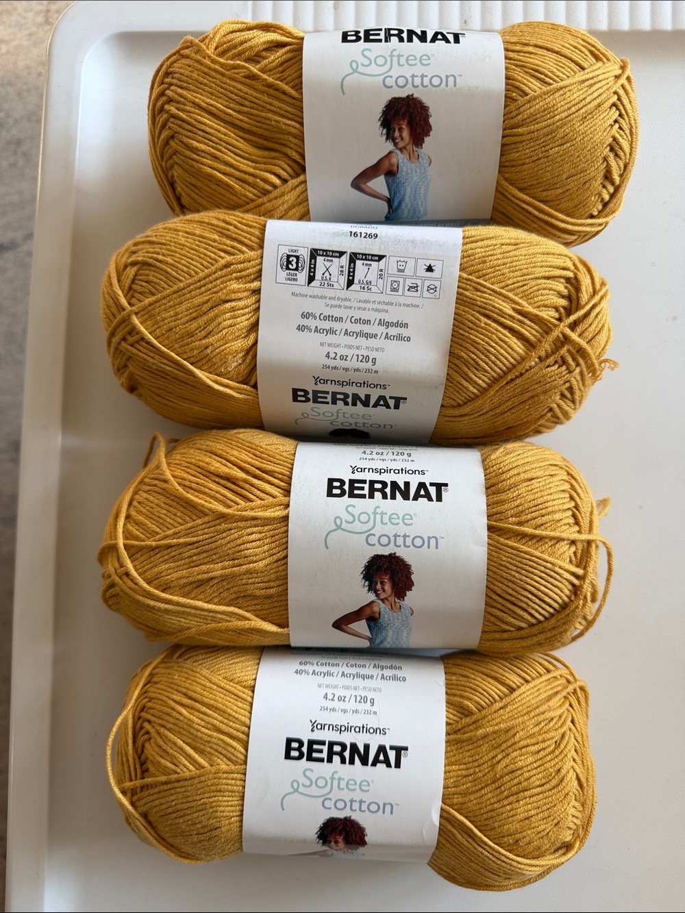 Bernat Sofee Cotton
Size 4.2 oz each
Color: Golden 
Lot of 4